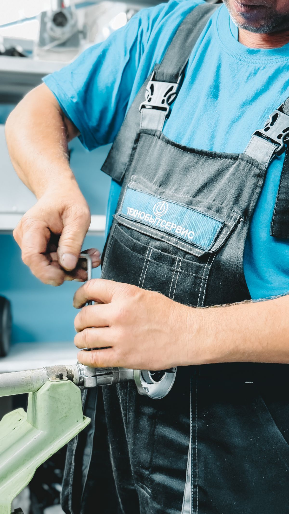 Technician installing rainwater filtration components